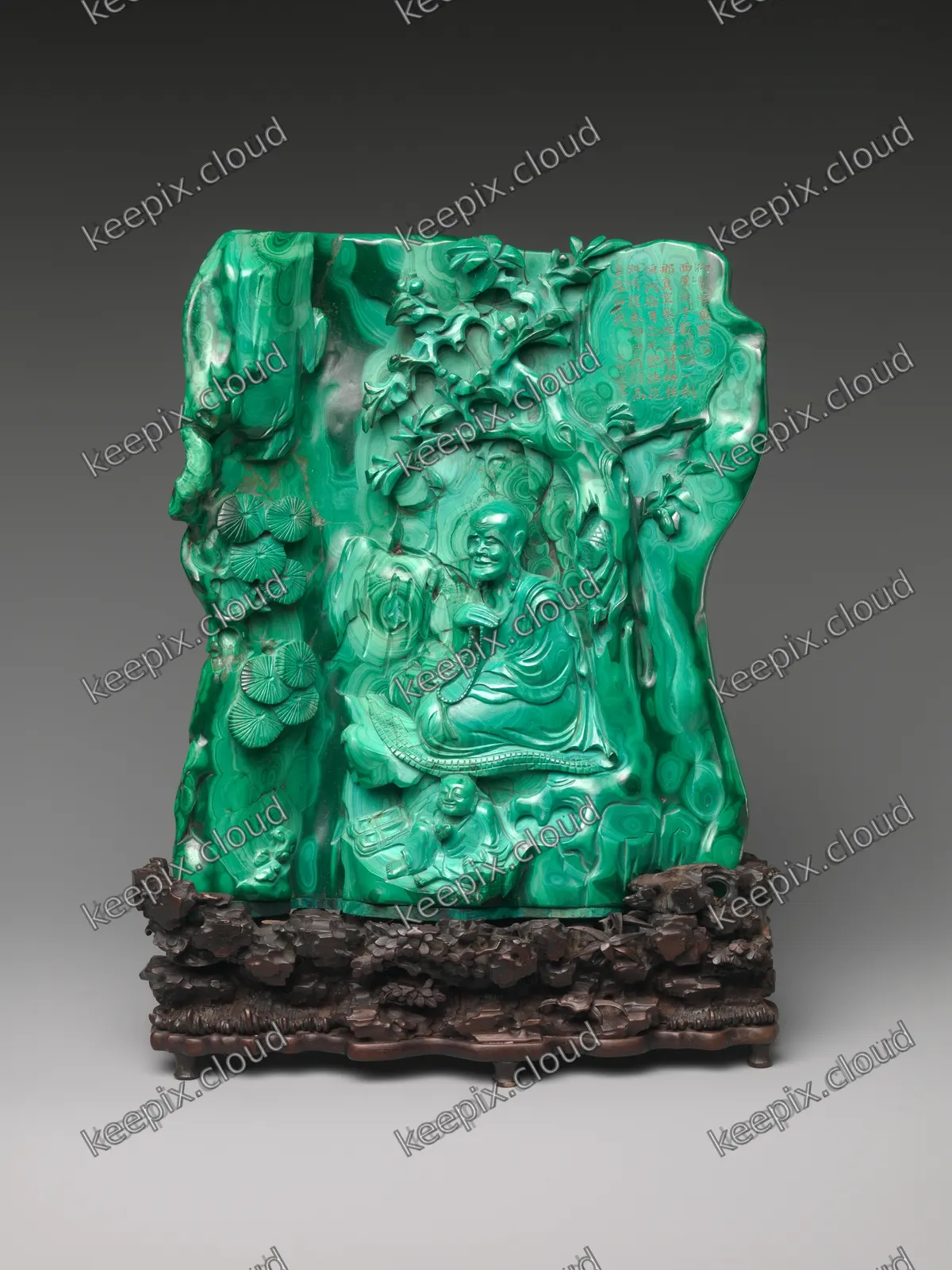 Seated luohan with a servant